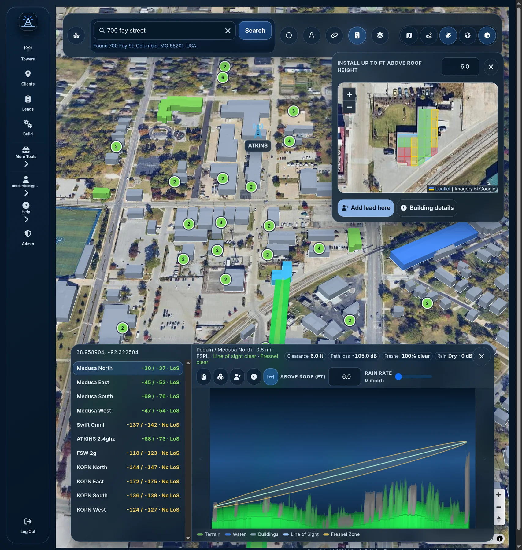 WISP Planner 3D terrain with building extrusions, visible-building overlay, and line-of-sight corridor.