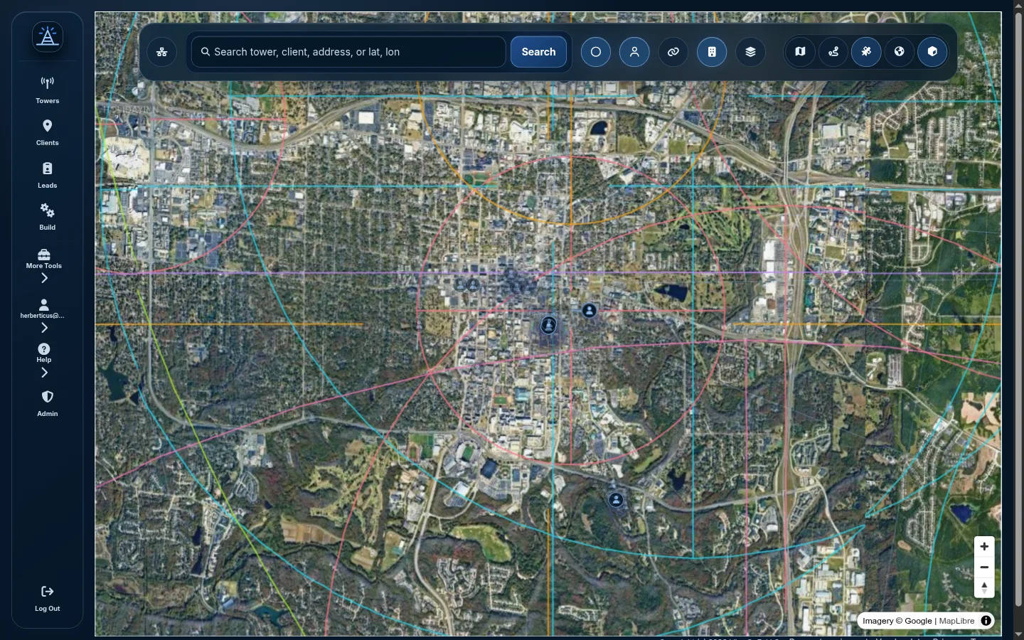 WISP Planner network map with tower radius rings, clients, and line-of-sight paths.